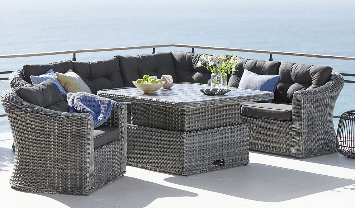 Set de muebles de jardín gris con sofá rinconera, sillón y mesa con altura regulable 