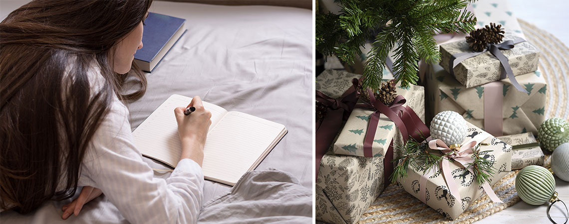 Mujeres tumbadas en la cama escribiendo la lista de la compra y los regalos de Navidad bajo el árbol
