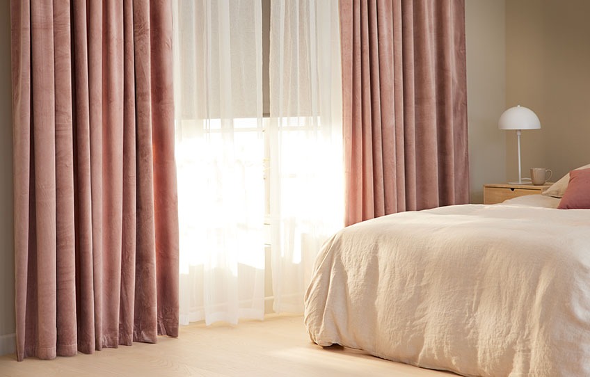 BOLMEN light curtains let in the light but protect you from curious glances from the outside Bedroom with black out roller blinds half way up and light curtains open