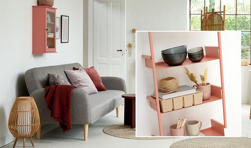 Living room with homeware in red and wall shelf in rose