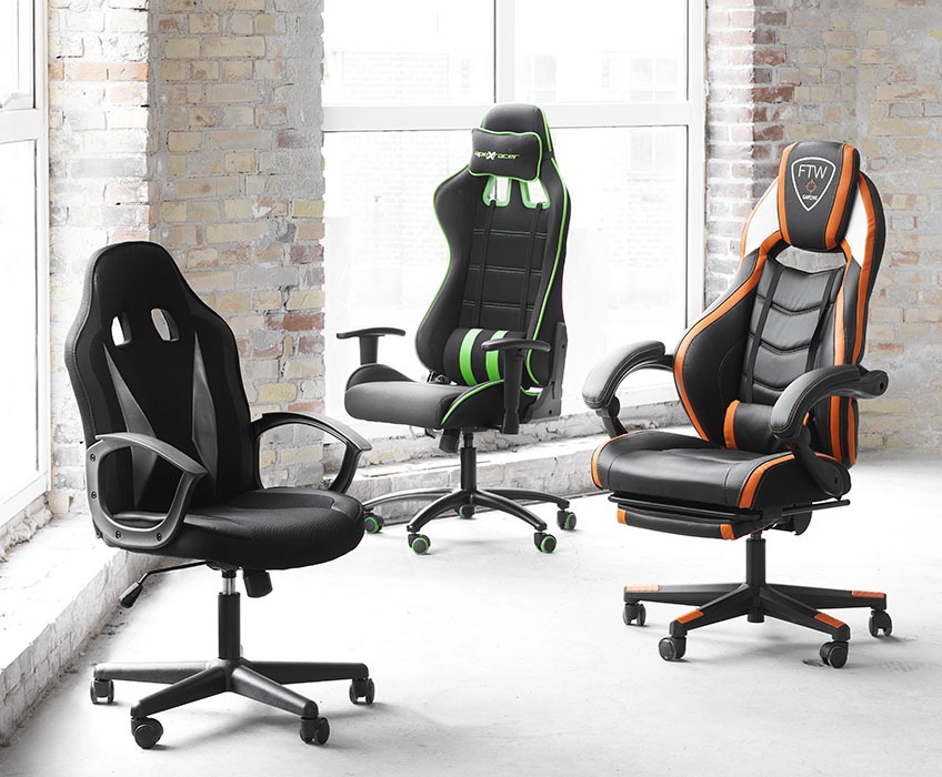 Three gaming chairs with green, orange, and grey details 