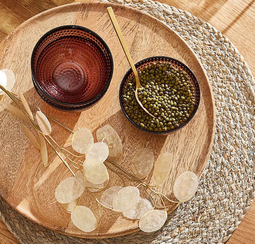 Wicker placemats with wooden decorative tray and, glass bowls 