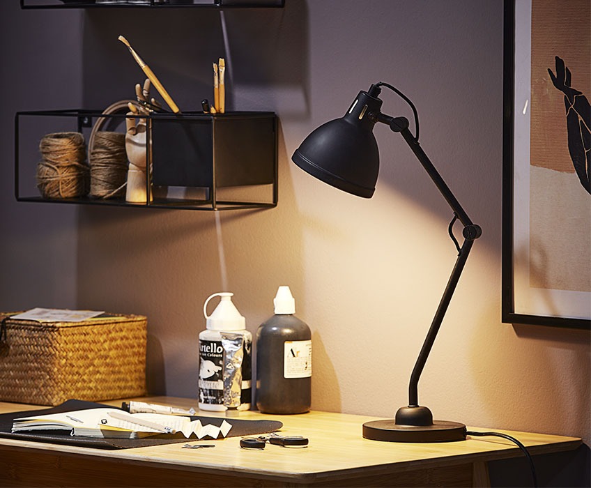 Black table lamp on office desk