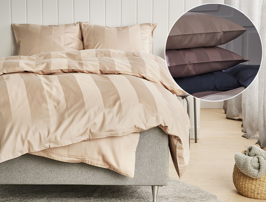 Dormitorio con ropa de cama de satén confeccionada en 60% algodón y 40% viscosa de bambú